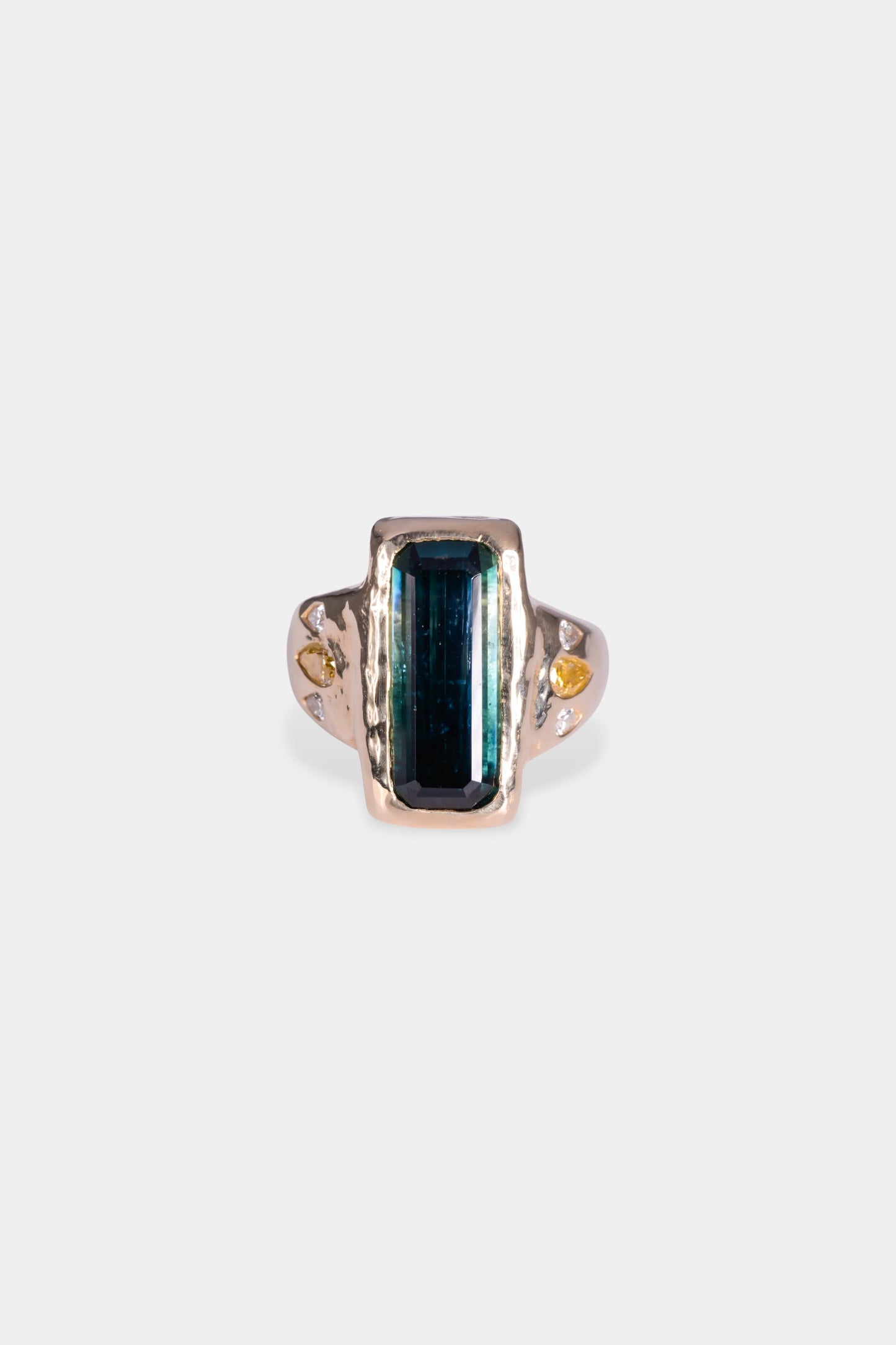 Portsea Ring
~ 6.5ct emerald cut bi colour tourmaline
~ two 0.25ct approx pear cut fancy yellow natural diamonds
~ four white pear cut melee diamonds