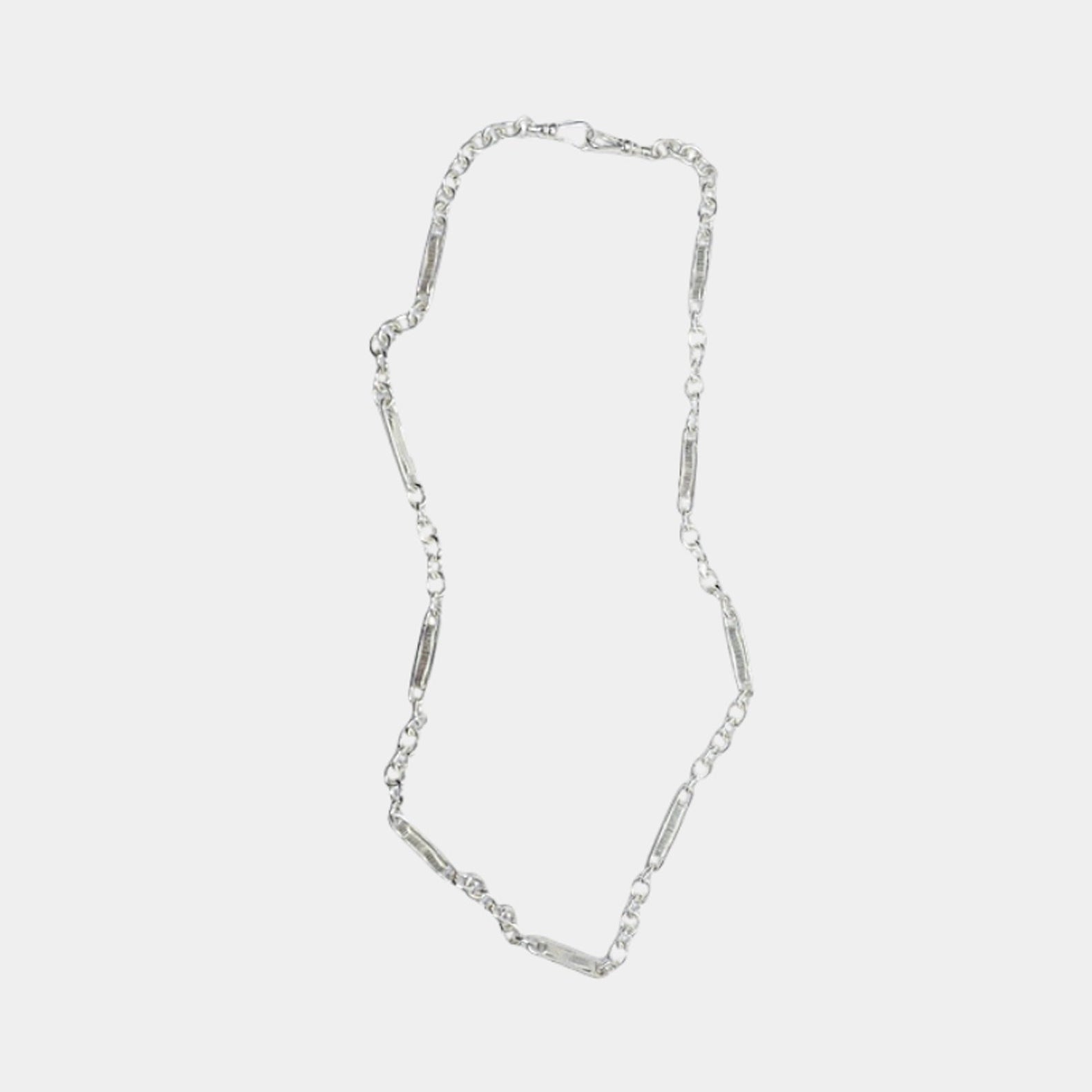 A silver chain necklace displayed against a white background.