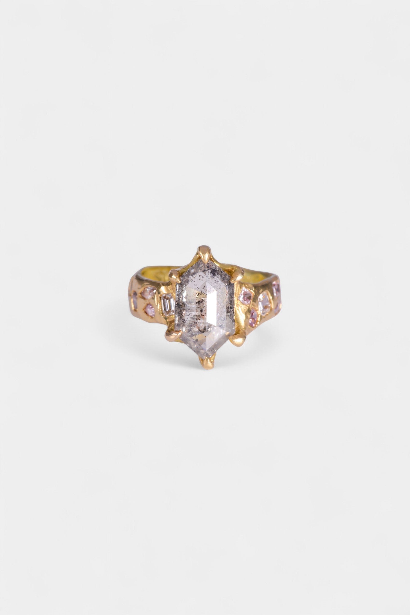Ice Queen Ring
solid 18 karat yellow gold
~ 2.97 carat hexagon cut salt & pepper diamond
~ twelve mixed cut melee white and grey diamonds for a carat weight of 1.1