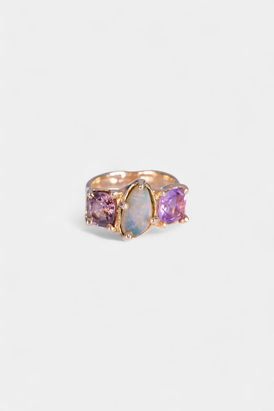 Orchid Ring
9 karat yellow gold
~ 2ct cushion cut purple spinel
~ 11.5x6mm solid Aussie opal
~ 8x8mm cushion cut purple kunzite
