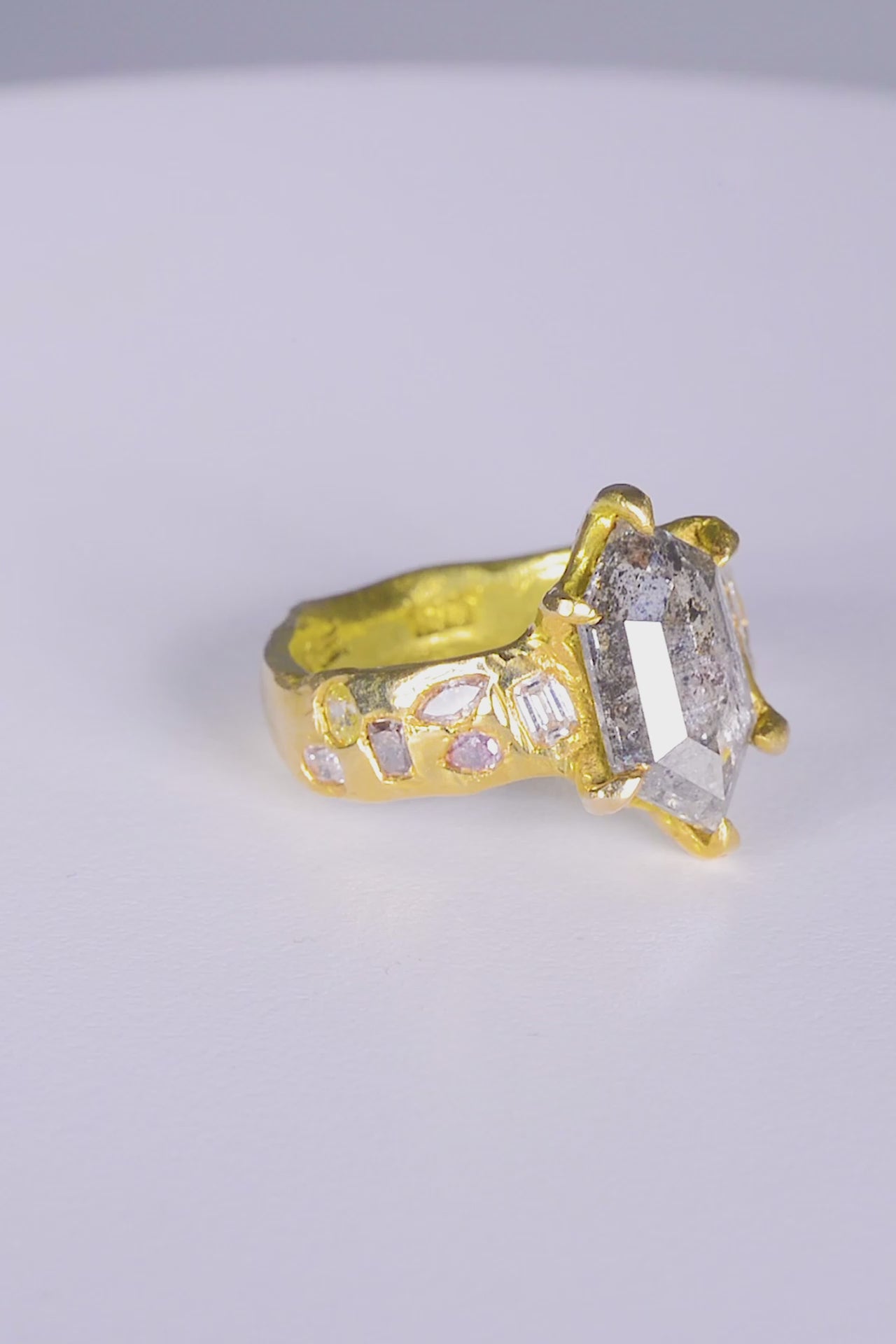 Ice Queen Ring
solid 18 karat yellow gold
~ 2.97 carat hexagon cut salt & pepper diamond
~ twelve mixed cut melee white and grey diamonds for a carat weight of 1.1